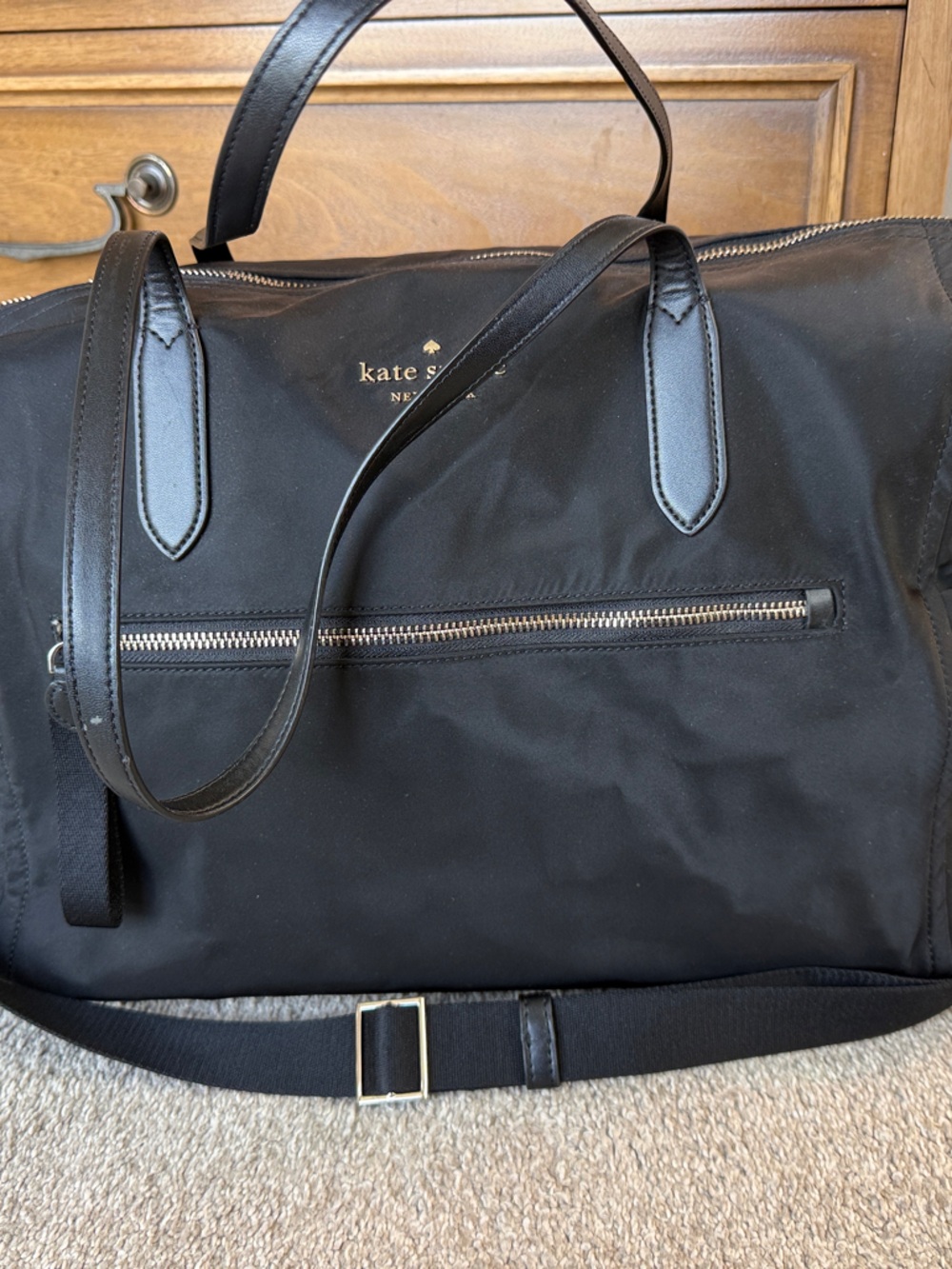 kate spade black travel duffel with front zip pocket